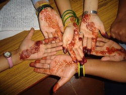 Hands decorated with hena