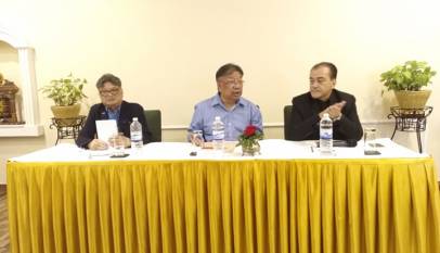 KGH Group founder Karna Sakya i the center